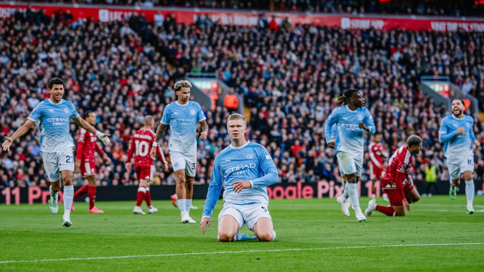City beat Liverpool: Erling Haaland knee-slides after scoring at Anfield